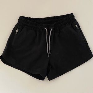 Girls black Athleta shorts. Size L/12
